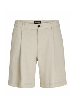 Beige lühikesed püksid, mis on valmistatud pehmest kangast, klõpsuga kinni, volditud esiosaga, kahe külje taskuga ja sirge lõikega, mis ulatub vaid üle põlve.