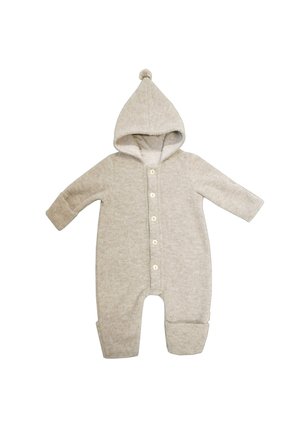 Soft beige baby onesie with long sleeves, button front, hood with pom-pom, and fold-over foot coverings laid flat on white background.