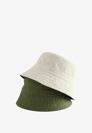 Two bucket hats stacked. One is light beige with a textured finish, and the other is dark green, both featuring a wide, flexible brim.