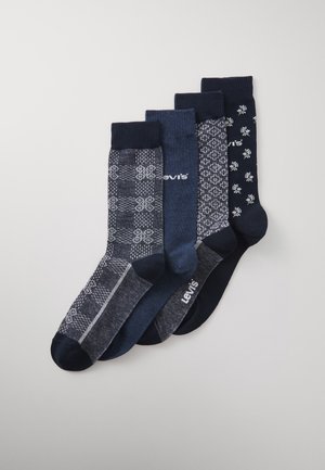 Five pairs of socks in varying shades of dark blue. Patterns include geometric designs and floral accents. Material appears soft and textured.