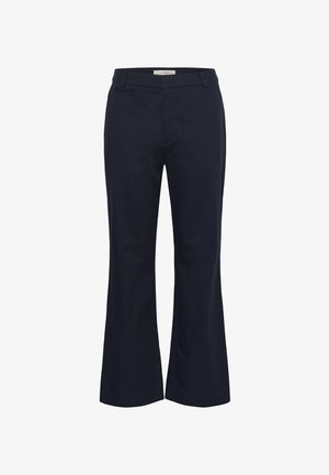 Donkerblauwe pantalons met rechte pijpen, riemlussen, een voorritssluiting en een klein voorzakje aan de rechterkant.