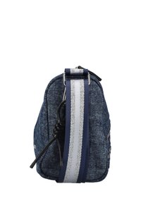 Denim crossbody bag with a navy and silver striped adjustable strap, zip closure, and textured fabric. Features a sleek, compact silhouette.