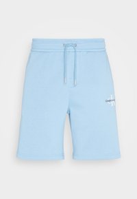 Light blue cotton shorts with an elastic waistband, drawstring, and embroidered logo. Smooth texture, knee-length cut, and plain design.