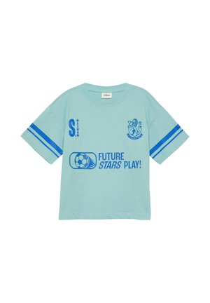 Light blue short-sleeve t-shirt with blue double sleeve stripes, soccer ball graphic, text "FUTURE STARS PLAY!" and lion crest logo on chest.
