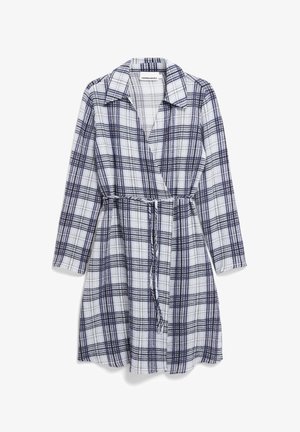 Plaid wrap dress featuring long sleeves, a collar, a tie belt, and a light fabric blend in navy and white check pattern.