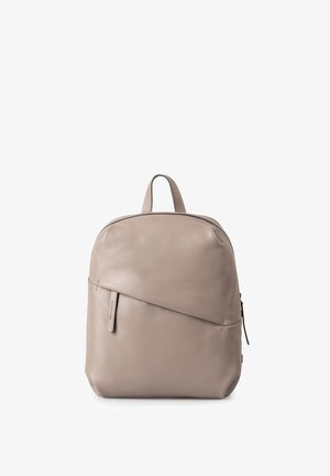 Light gray leather backpack with a rounded shape, front diagonal zipper pocket, top handle, and subtle stitched accents.