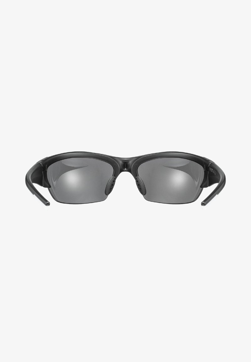 Sport sunglasses with black frame, gray lenses, and textured nose pads. Features curved arms and silver accents on the temple tips.