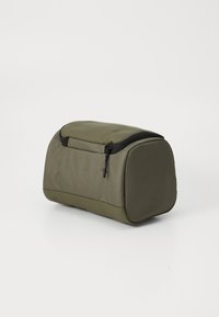 Olive green rectangular toiletry bag made of durable fabric with a smooth texture, featuring a zip closure and rounded edges.