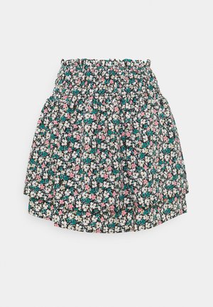 Floral patterned skirt with a smocked waistband. Features small pink, white, and turquoise flowers on a black background. Lightweight fabric.