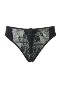 Mutandine in pizzo nero a forma di bikini con motivi floreali e pannelli laterali solidi, caratterizzate da un piccolo fiocco al centro della vita anteriore.