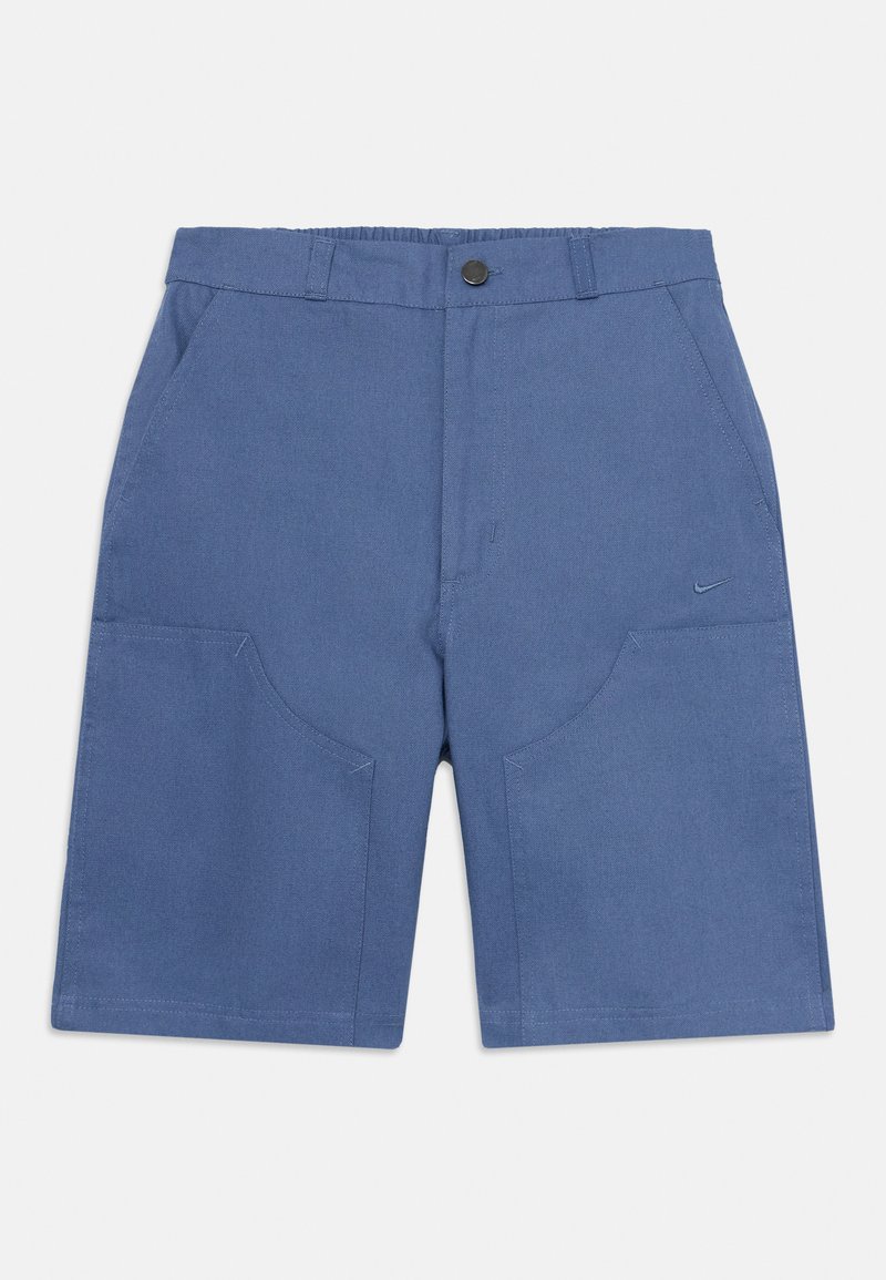 Calções azuis feitos de tecido texturizado, com dois bolsos frontais, fecho com botão e um pequeno logótipo da Nike na lateral.