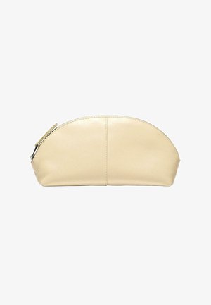 Beige leather cosmetic pouch, rounded shape, smooth texture, top zip closure, single stitched seam across the body, minimalistic design.