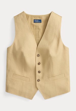 Bézs színű lenmellény mély V-nyakkivágással, öt barna gombbal az elején és két elülső zsebbel. Simább textúrájú, szabott fazonú, az alsó szegély enyhén ívelt.