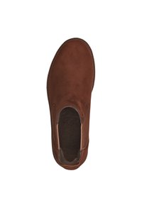 Braune Wildleder-Slipper mit elastischen Seitenelementen und einer abgerundeten Zehenpartie. Strukturierte Einlegesohle und ein kontrastierendes braunes Stichdetail entlang der Sohle.