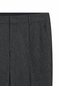 Gray trousers with a herringbone pattern, front pleats, and belt loops. Made of textured fabric with a smooth finish.