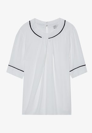 Hvid kortærmet bluse med rund halsudskæring, der har sort kant langs kraven og ærmerne, samt en nøglehulslukning i ryggen.