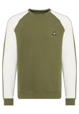 Olive green sweatshirt with white raglan sleeves, ribbed texture, crew neck, and small black triangular logo on the chest.