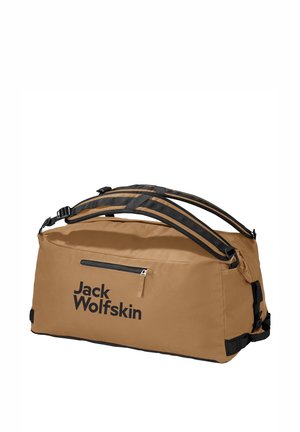 Bruine stoffen sporttas met zwarte accenten, voorzien van een bovenrits, verstelbare schouderbanden en een voorvak met rits. Groot logo gedrukt aan de zijkant.