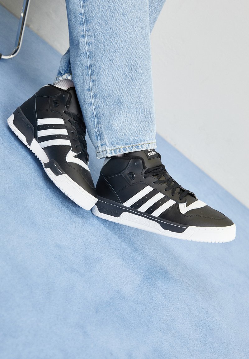 Adidas mid high sneakers Clearance