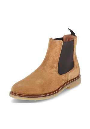 Tan suede Chelsea boot with black elastic side panels and a light rubber sole, shown from a front side angle.