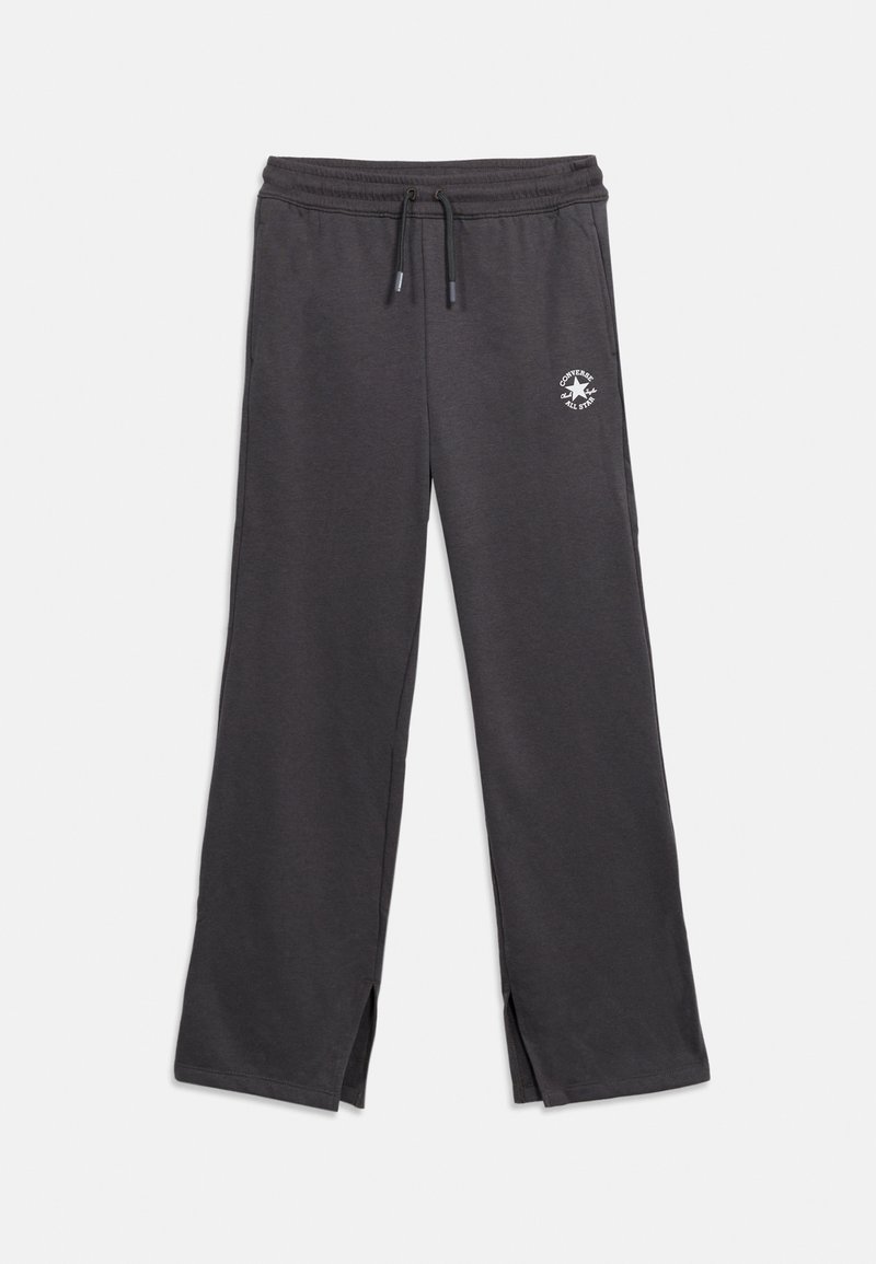 Σκούρο γκρι φούτερ παντελόνι με ελαστική μέση, κορδόνια, πλαϊνές τσέπες, μικρό λευκό λογότυπο Converse All Star στο αριστερό μηρό και ανοίγματα στους αστραγάλους.