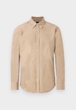 Beige langermet skjorte med knapper, knappkrage og lite brodert logo på venstre bryst.