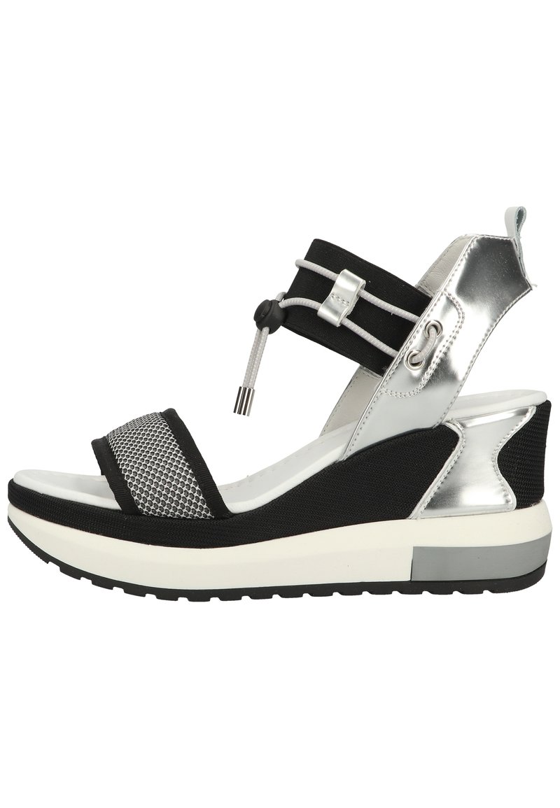 Black and silver sandal with mesh front strap, elastic ankle band, and chunky white midsole. Textured materials provide contrast and support.
