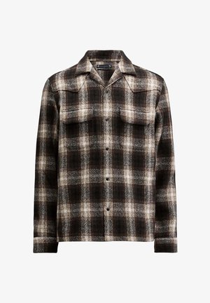 Sort og hvidt ternet skjorte i en uldblanding, med spids krave og to brystlommer, samt knaplukninger ned foran.