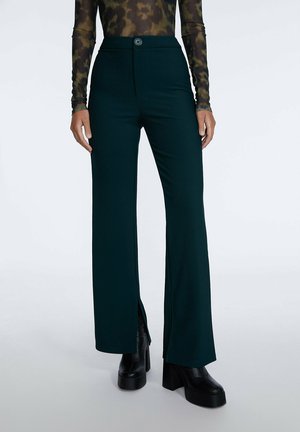MIT SCHLITZ AM SAUM - Tygbyxor - mottled green