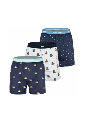 Trois paires de boxers à motifs : bleu marine avec des voitures jaunes, blanc avec des ours en peluche marron et bleu marine avec des petits cœurs, chacun avec une ceinture de marque.