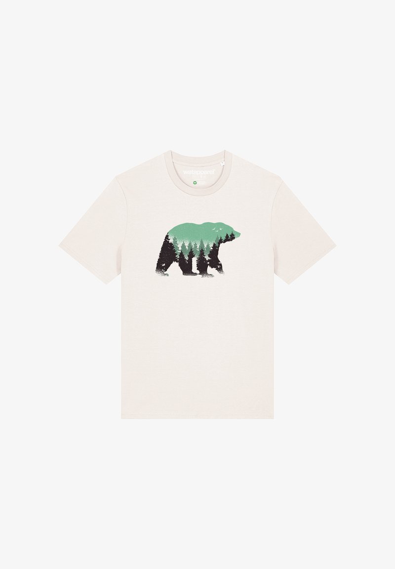 T-shirt en coton crème présentant une silhouette d'ours remplie d'arbres verts et de détails de forêt noirs. Manches courtes, col rond.