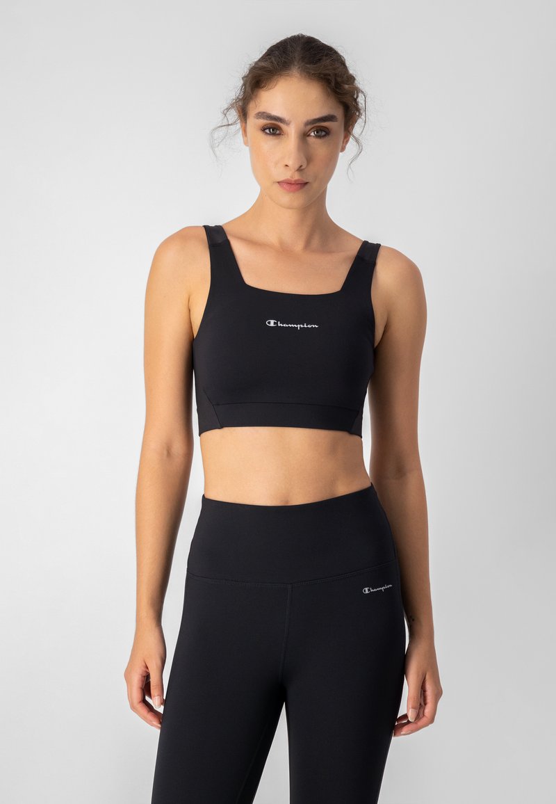 Champion Medium support sports bra black Zalando.de