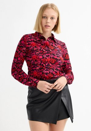 Falda acampanada - black