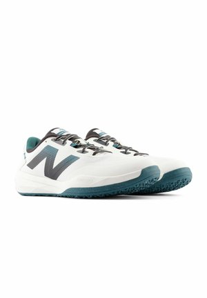 White athletic shoes with gray accents, a large gray "N" logo, textured mesh upper, and teal soles designed for traction.