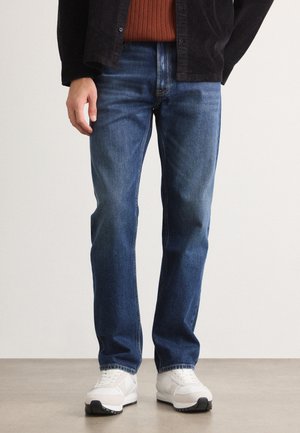 Jeans a sigaretta - oil slick