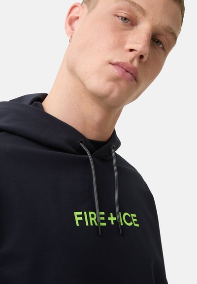 Navy hoodie featuring a front graphic that reads "FIRE+ICE" in bright green. It has a drawstring hood and a soft texture.