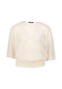 Haut crème à manches courtes fabriqué à partir d'un tissu texturé avec un subtil motif en zigzag. Présente un col rond et une coupe cropped.