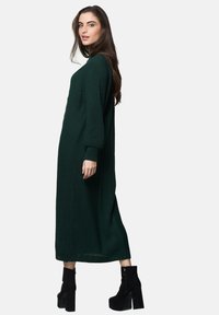 Elara Abito in maglia - grün