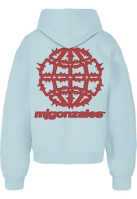 Hele sinine kapuutsiga särk, mille seljal on suur ja detailne punane graafiline kujundus, mille all on brändi nimi "mjgonzales" julgete tähtedega.