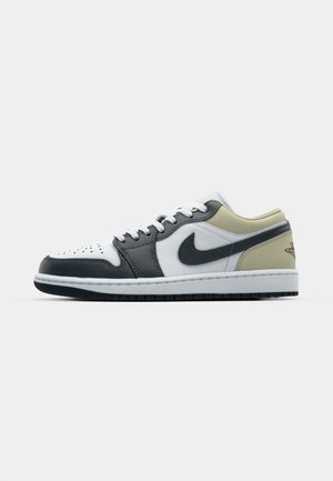 Nike Air Jordan 1 Low sneaker featuring white leather upper, gray and olive green accents, round white laces, and black rubber sole.
