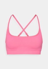 Bralette rose en tissu lisse, avec un design court et des bretelles croisées pour un soutien et un confort optimal.
