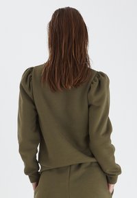 Olivgrüner Sweatshirt mit Puffärmeln, Rundhalsausschnitt und strukturiertem Stoff. Die Rückansicht zeigt eine glatte Oberfläche und eine lockere Passform.