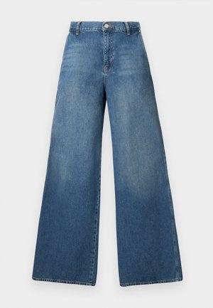 Hoch taillierte blaue Jeans aus Denim mit weiten Beinen, vorne mit Knöpfen, Reißverschluss und Gürtelschlaufen.