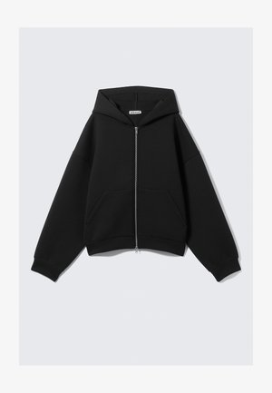 Zwarte crop hoodie gemaakt van zachte stof, voorzien van een volledige rits, grote voorzakken en een capuchon met trekkoorden in een comfortabele pasvorm.
