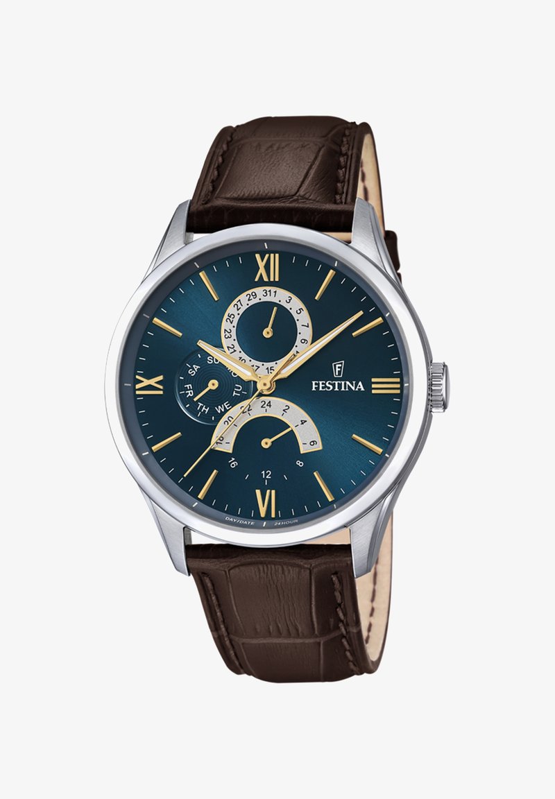 Strieborné nerezové hodinky s modrým ciferníkom, zlatými indexmi a hnedým koženým remienkom s krokodíljou vzorom. Obsahujú viacero subciferníkov.