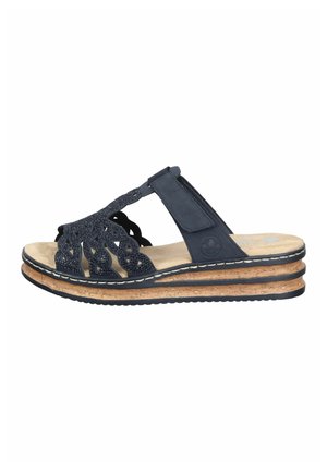 Navy blue wedge sandal with decorative cut-out straps, velcro closure, cushioned insole, and layered cork sole.