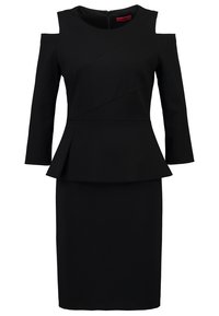 Schwarzes Peplum-Kleid mit langen Ärmeln, ausgestattet mit Ausschnitten an den Schultern und diagonalen Nähten. Hergestellt aus einem strukturierten Stoff mit einer taillierten Silhouette.