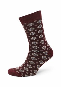 Bordeauxrote Socken mit einem strukturierten Muster aus weißen und blauen Blumenmotiven sowie Rautenformen. Gerippter Bund und verstärkte Zehen.