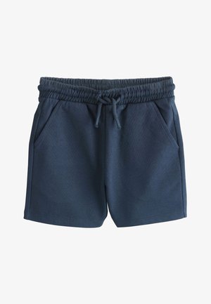 Tmavomodré elastické nohavice s elastickým pásom so stiahnutím na šnúrku, dvoma bočnými vreckami a voľným strihom.