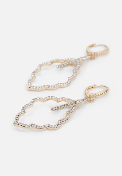 Gold leaf-shaped earrings adorned with sparkling stones, featuring a scalloped edge and a secure clasp for attachment.